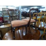 SET OF SIX VICTORIAN MAHOGANY DINING CHAIRS, each with scroll carved bar back, flat fronted stuff-