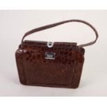 LADY'S VINTAGE BROWN CROCODILE HANDBAG with chrome fitting, loop handle, 9in (22.8cm) wide, with