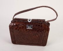 LADY'S VINTAGE BROWN CROCODILE HANDBAG with chrome fitting, loop handle, 9in (22.8cm) wide, with