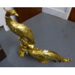 A PAIR OF MODERN GILT COMPOSITION HEARTH ORNAMENTS, IN THE FORM OF EXOTIC BIRDS