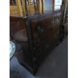 A LARGE MAHOGANY CHEST OF DRAWERS, HAVING THREE DEEP DRAWERS ABOVE THREE LONG DRAWERS, RAISED ON