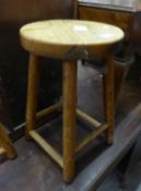 A PITCH PINE CIRCULAR KITCHEN STOOL