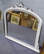 WHITE AND BLACK PAINTED OVERMANTLE MIRROR, with pierced and scroll carved cresting and side