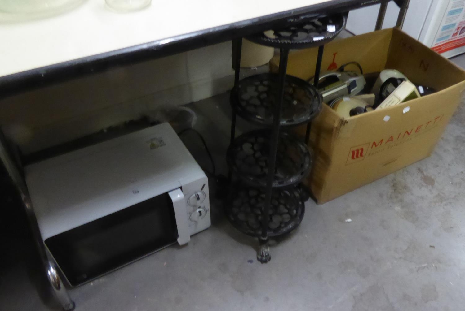 MICROWAVE OVEN, TOASTER, JUG KETTLE, STEAM IRON AND PANS ON BLACK METAL PAN STAND