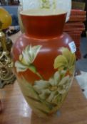 A WHITE OPAQUE GLASS OVULAR VASE, PAINTED WITH LARGE FLOWERS ON YELLOW AND RED GROUND