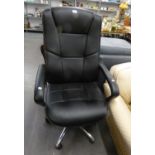 AN EXECUTIVE?S BLACK UPHOLSTERED REVOLVING OFFICE ARMCHAIR, ON BRIGHT METAL FIVE SPUR BASE WITH