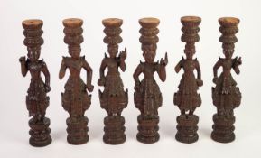 SIX EARLY TWENTIETH CENTURY FAR EASTERN TAIWANESE OR BURMESE TURNED AND CARVED HARDWOOD FIGURAL