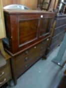 AN EARLY 20TH CENTURY MAHOGANY DRESSING CHEST WITH THREE GRADUATED LONG DRAWERS AND FRAMELESS