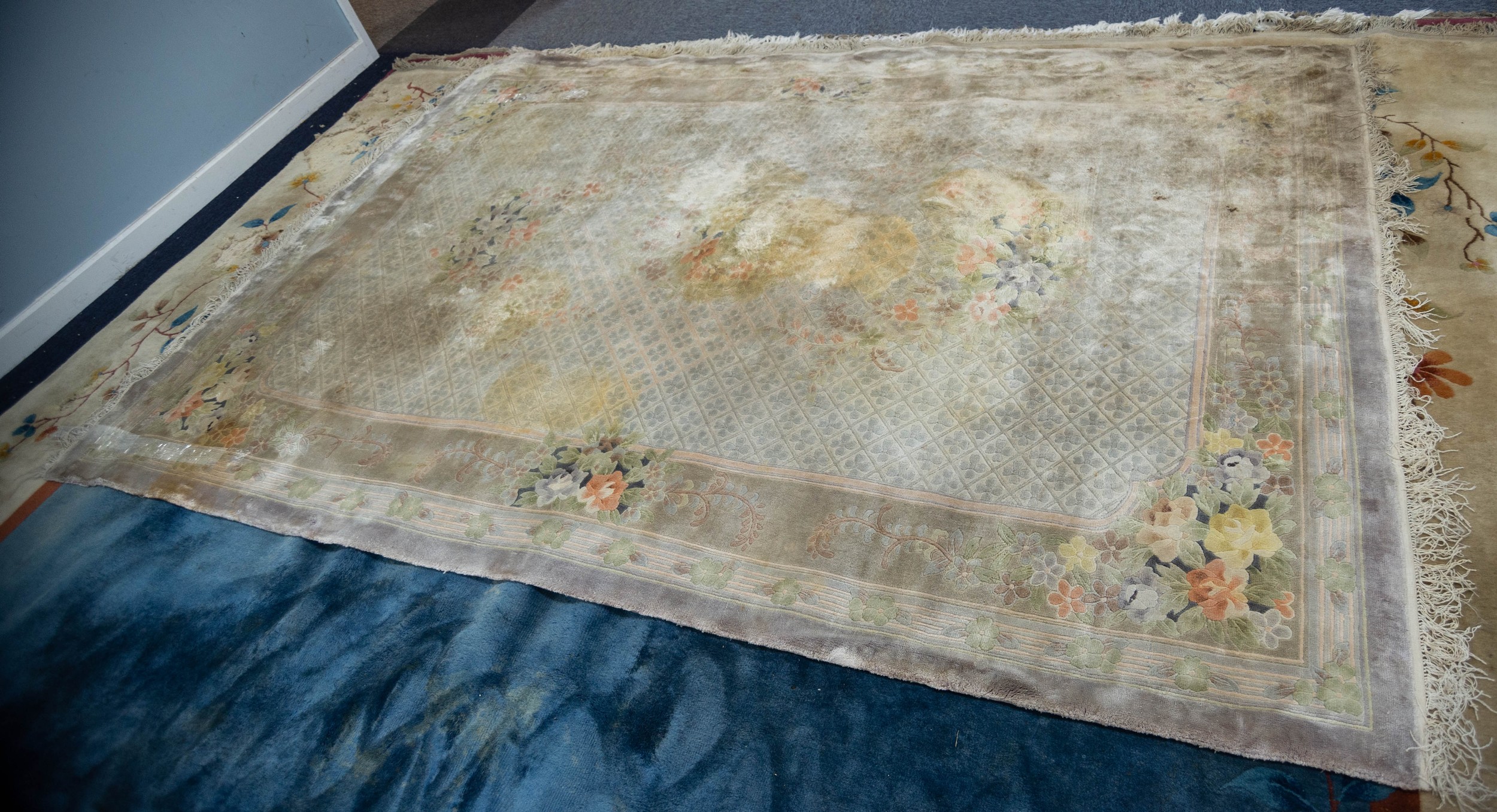 WASHED CHINESE PART SILK EMBOSSED CARPET with random floral bouquets on an all-over diaper