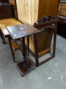 AN EARLY 20TH CENTURY DARK STAINED WOOD TORCHÈRE WITH SQUARE TOP AND BASE, BALUSTER TURNED COLUMN