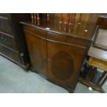 A MAHOGANY TWO DOOR TELEVISION CABINET; A SMALL OLD STYLE TELEVISION AND A HUMAX VIDEO CASSETTE