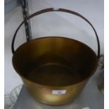 A LARGE BRASS JAM PAN WITH HOOP HANDLE