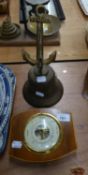 A SMALL ANEROID WALL BAROMETER AND A LARGE WALL MOUNTED BRASS SHIP?S BELL (2)