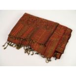 MACHINE WOVEN PAISLEY SHAWL OR WRAP of typical design in brown, orange and red, fringed to short