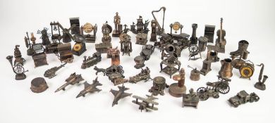 APPROX SIXTY COPPER FINISH METALLIC NOVELTY PENCIL SHARPENERS, to include; aircraft, windmill, harp,