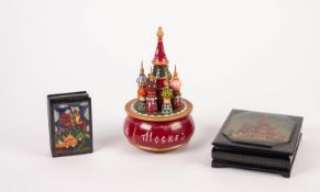 MODERN RUSSIAN PAINTED LACQUER OBLONG BOX, front showing view of Saint Basil's Cathedral, Moscow,