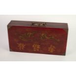 CHINESE CHARACTERS MOULDED COMPOSITION CHESS SET, housed in a fitted box, decorated to the