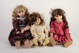 THREE EARLY TWENTIETH CENTURY STYLE BISQUE SWIVEL HEADED DOLLS, with ceramic ball-jointed bodies,