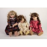 THREE EARLY TWENTIETH CENTURY STYLE BISQUE SWIVEL HEADED DOLLS, with ceramic ball-jointed bodies,