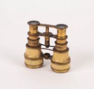 PAIR OF FRENCH UNUSUAL EARLY TWENTIETH CENTURY GILT METAL AND IVORINE OPERA GLASSES, with spring