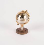 SMALL 'WINDMILL' JAPAN GILT AND SILVERED METAL WORLD GLOBE PATTERN TABLE LIGHTER, opening to