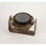 NAUTICAL GIMBAL MOUNTED COMPASS, brass and black enamel, the metal bezel stamped type P.11 No.
