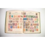 ALL WORLD COLLECTION housed in the green 'Everyland' stamp album