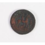 POSSIBLY ROMAN HAMMERED BRONZE COIN, obverse with a laurel garlanded head facing left, reverse