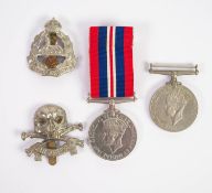 TWO 1939-1945 WAR MEDALS, one only with ribbon.  TOGETHER WITH 'DEATH OR GLORY' 17/21 LANCERS CAP