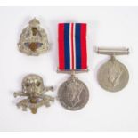 TWO 1939-1945 WAR MEDALS, one only with ribbon.  TOGETHER WITH 'DEATH OR GLORY' 17/21 LANCERS CAP