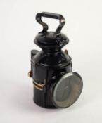 A PRE-WAR LNE/GER RAILWAY GUARDS HAND LAMP, black painted  metal with brass slide knob handles to