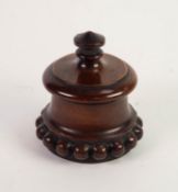 NINETEENTH CENTURY CARVED AND STAINED FRUITWOOD TOBACCO JAR AND COVER, of slightly tapering form