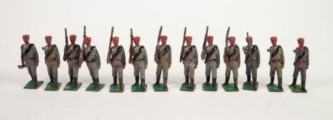 THIRTEEN CIRCA 1908 BRITAIN'S TOY SOLDIERS 'EGYPTIAN INFANTRY' with grey blue jacket and trousers