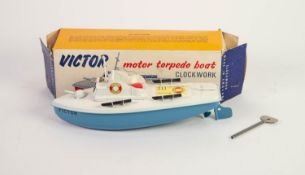 BOXEDS SUTCLIFFE METAL VICTOR CLOCKWORK MOTOR TORPEDO BOAT, in excellent condition, box somewhat
