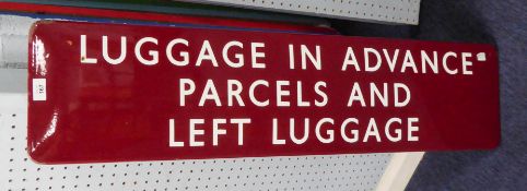 WHITE ON MAROON METAL OBLONG SIGN 'LUGGAGE IN ADVANCE, PARCELS AND LEFT LUGGAGE', of typical form