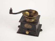 J & W. RINDLAY - LIVERPOOL LATE NINETEENTH CENTURY CAST IRON AND BRASS COFFEE GRINDER of typical