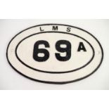 HEAVY L.M.S. CAST IRON OVAL BRIDGE PLATE, BLACK ON WHITE , LMS 69A  17 3/4" x 11 5/8" (45.2cm x 29.