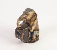 EARLY TWENTIETH CENTURY COLD PAINTED HOLLOW CAST ALLOY MONEY BOX, in the form of a seated elephant