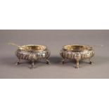 MATCH PAIR OF VICTORIAN SILVER ROCOCO OVAL SALTS repousse with spiral lobes, egg and dart borders
