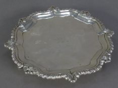 GEORGE II SILVER CARD TRAY, with galleon crest to the plain centre, shell capped gadrooned and