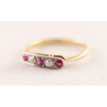 EDWARDIAN 10ct GOLD AND PLATINUM RING with collet oval top, having a row of two old cut diamonds and