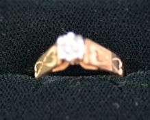 9ct GOLD RING with a tiny diamond in a floral deceptive setting, heart decorated shoulders, 2.8 gns,