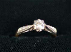 18ct YELLOW AND WHITE GOLD RING with a single illusion-set diamond