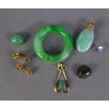 CHINESE SMALL TEAR SHAPED GREEN PENDANT; a silver gilt and green stone openwork PENDANT; a jade