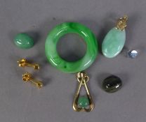 CHINESE SMALL TEAR SHAPED GREEN PENDANT; a silver gilt and green stone openwork PENDANT; a jade