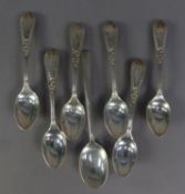SET OF SIX EDWARDIAN SILVER TEASPOONS with double struck fancy handles, bead and bar borders, makers