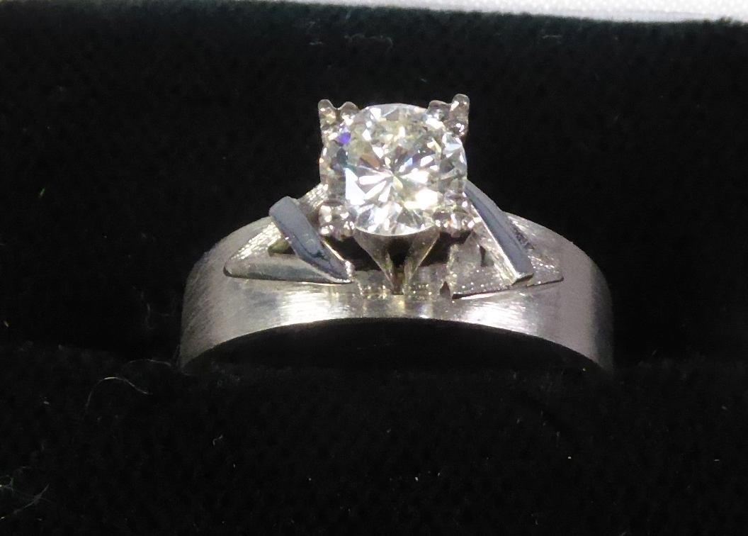 18ct WHITE MATT GOLD RING with broad flat shank with a round brilliant cut solitaire diamond in a