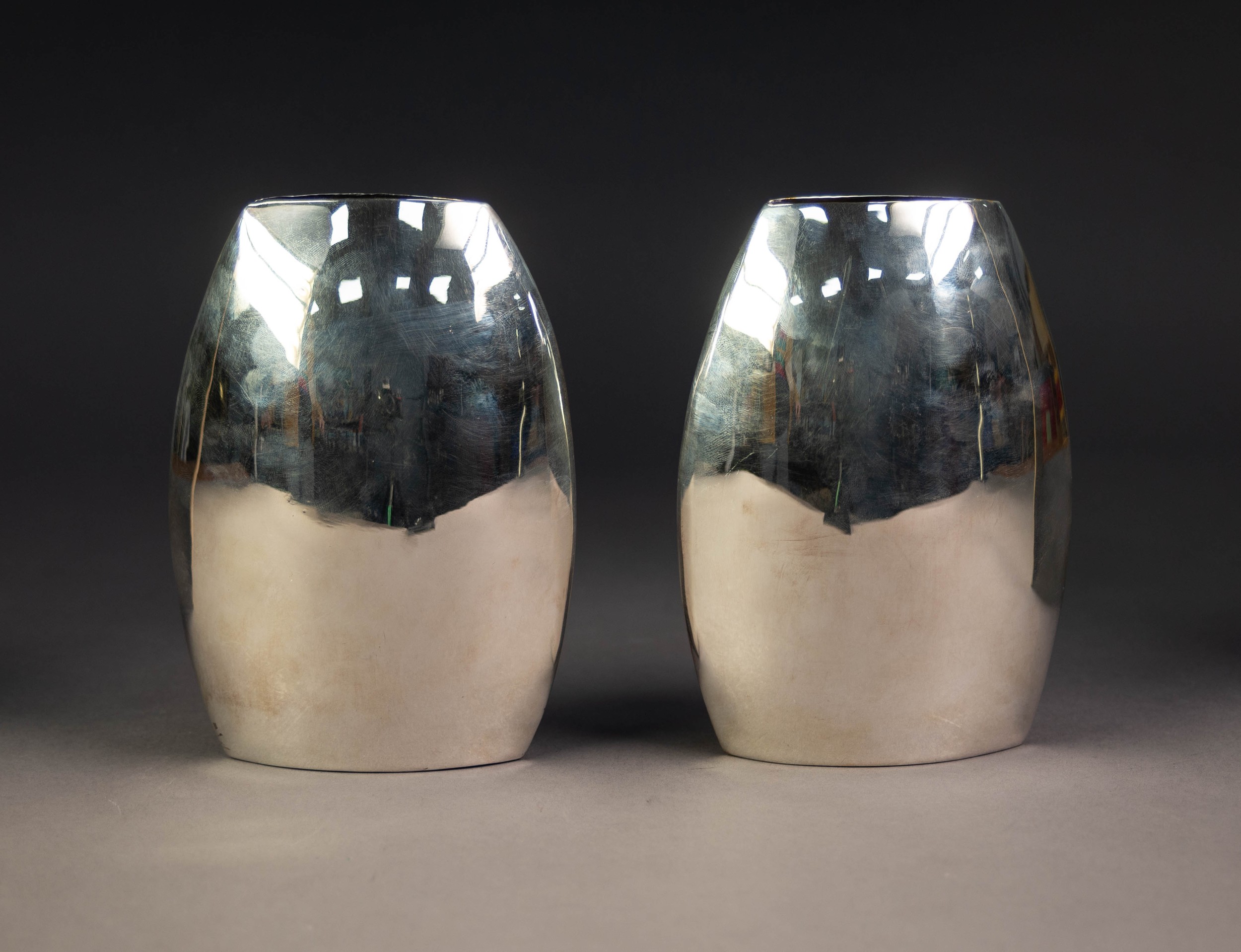 STYLISH PAIR OF MODERN ELECTROPLATED VASES, each of elliptical form, 6 ¼? (15.9cm) high,