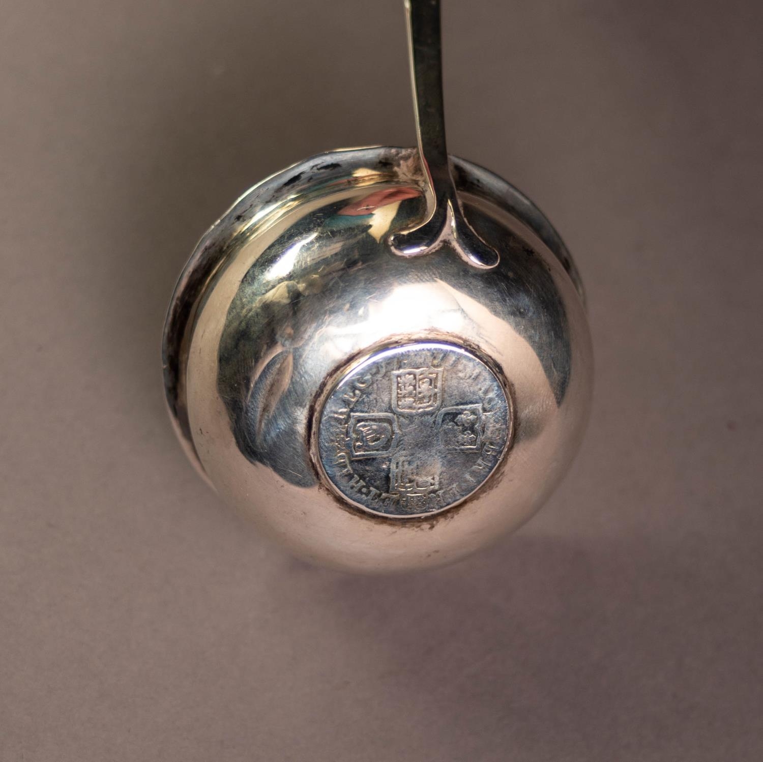 UNMARKED ANTIQUE SILVER COLOURED METAL TODDY LADLE with coin centre and twisted whale bone handle, - Image 2 of 2