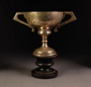 GEORGE V SILVER TWO HANDLED TROPHY CUP, of typical form with angular scroll handles, 7 ¼? (18.4cm)